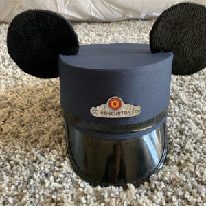 Mickey conductor red trolley ears.